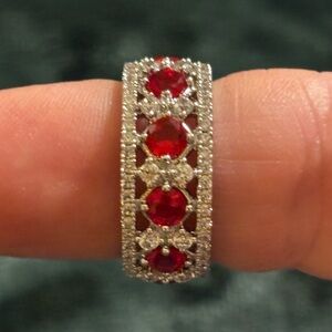 Elegant Silver and Red Gemstone Eternity Ring